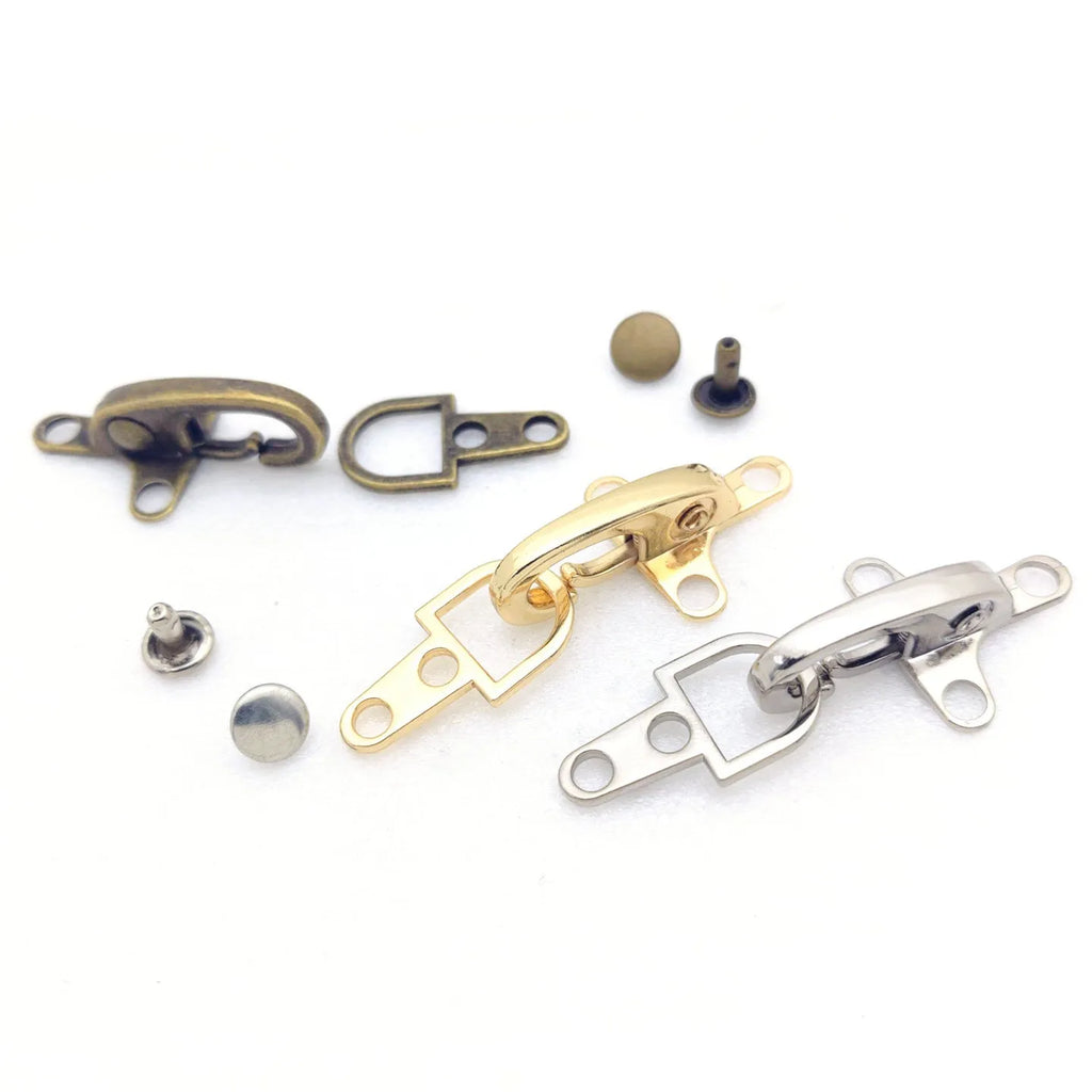 Alloy metal aircraft buckle decoration measuring 5.85cm in bronze, gold, gun colour or silver finish