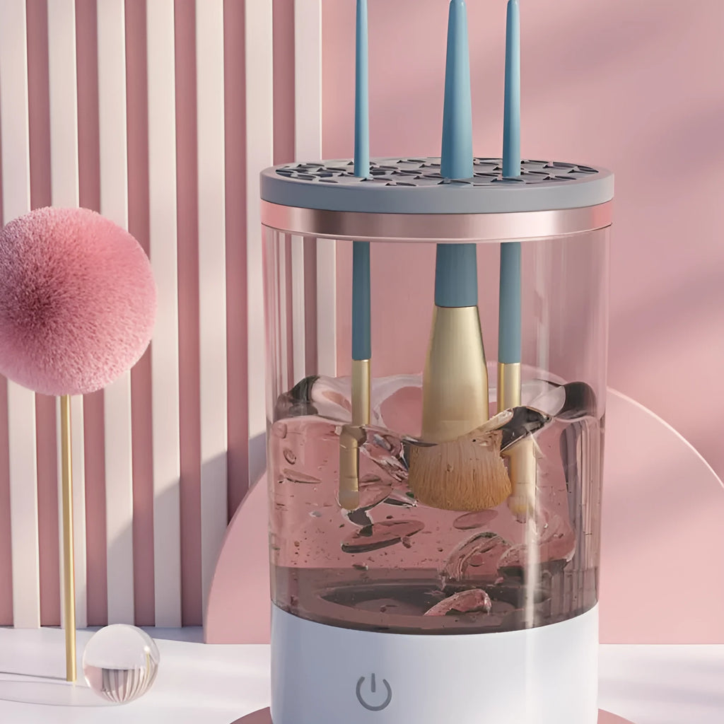 Grey and white portable electric makeup brush cleaner with USB cable.