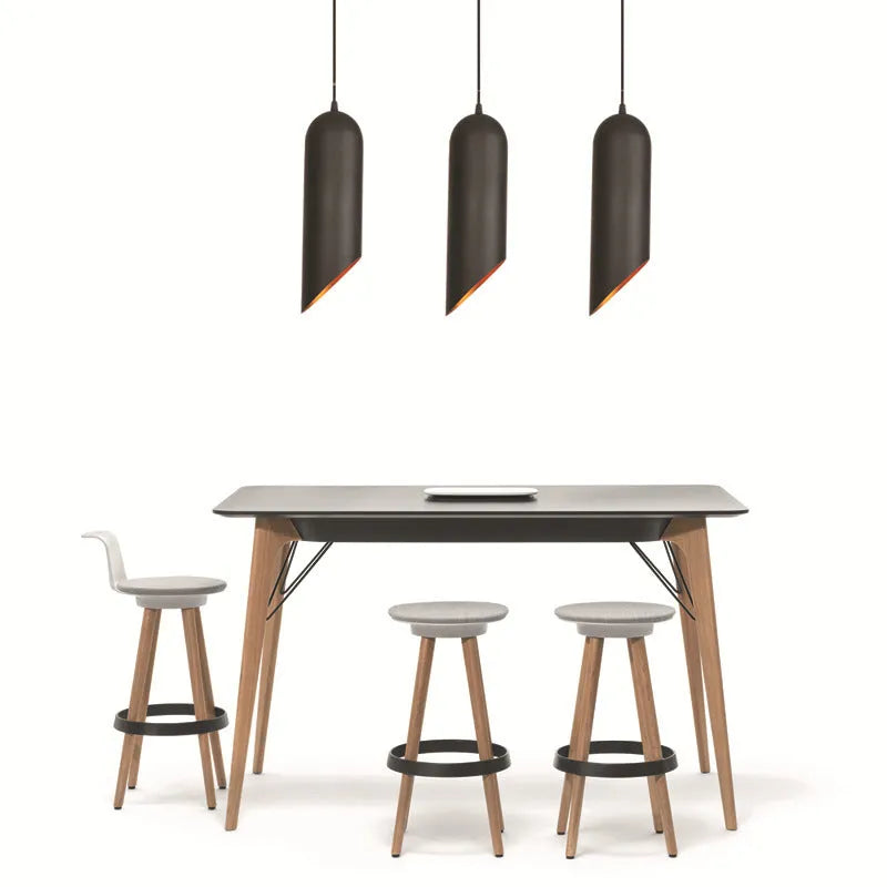 Matte black retro iron chandelier with multiple arms, shown against a neutral wall.