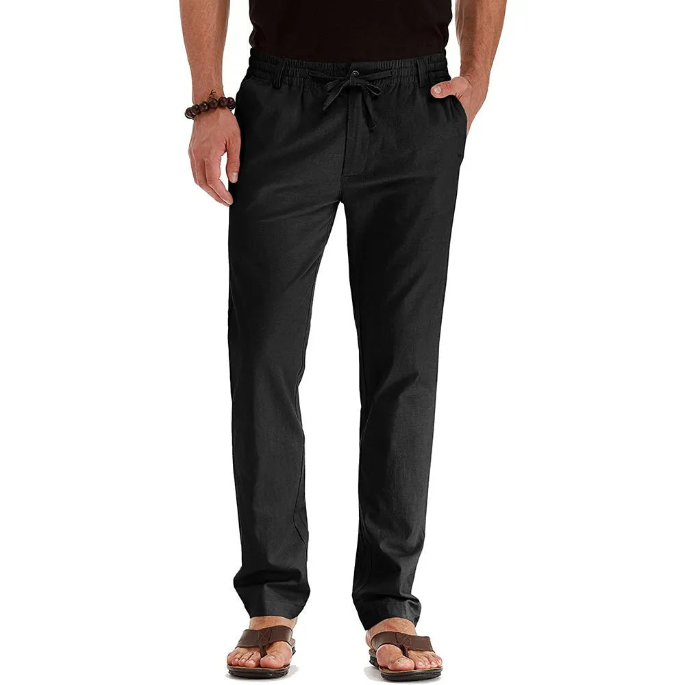 Men's loose oversized cotton blend straight-leg track pants in army green, front view