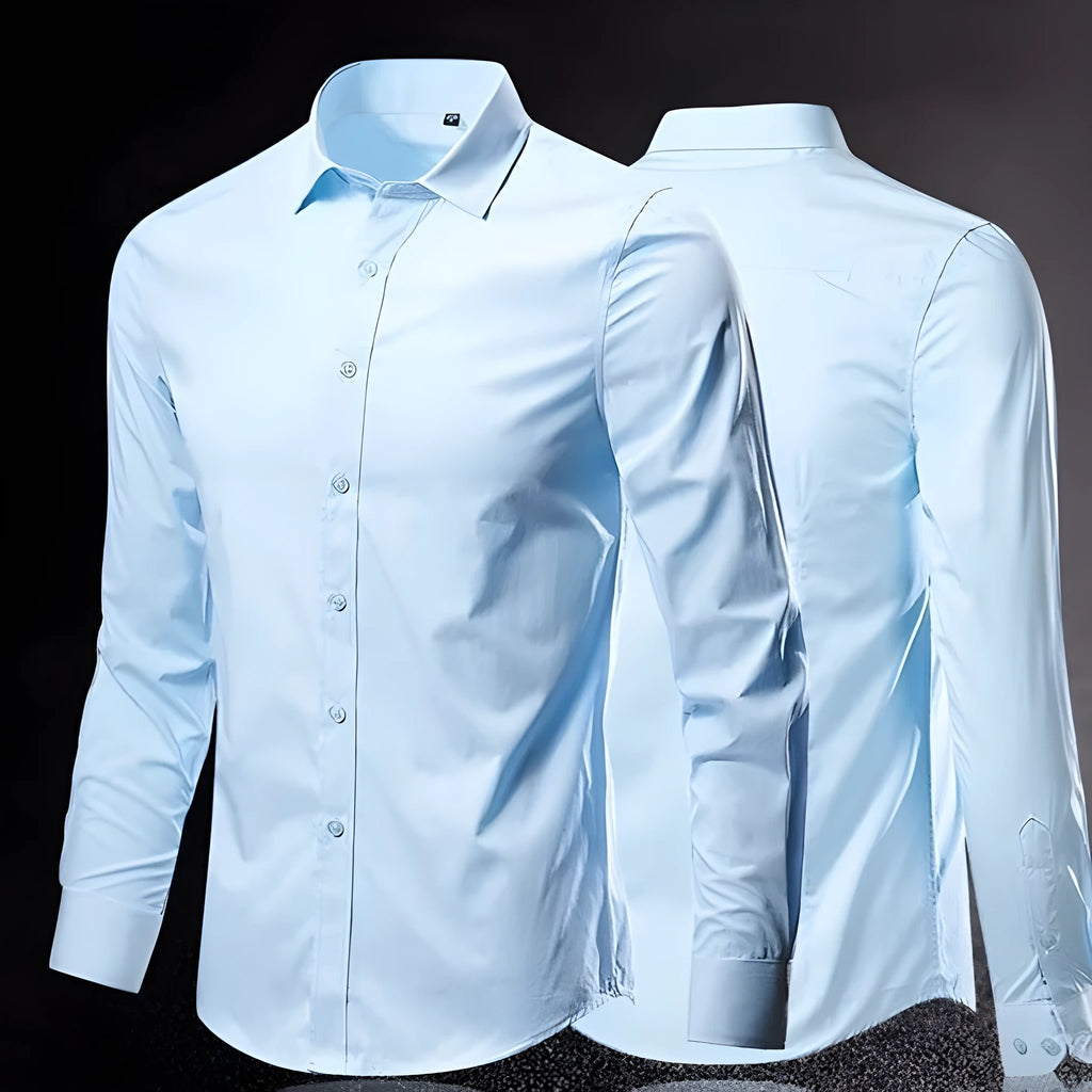 Man wearing a loose-fit long-sleeve linen shirt in a neutral colour, showcasing the casual style.