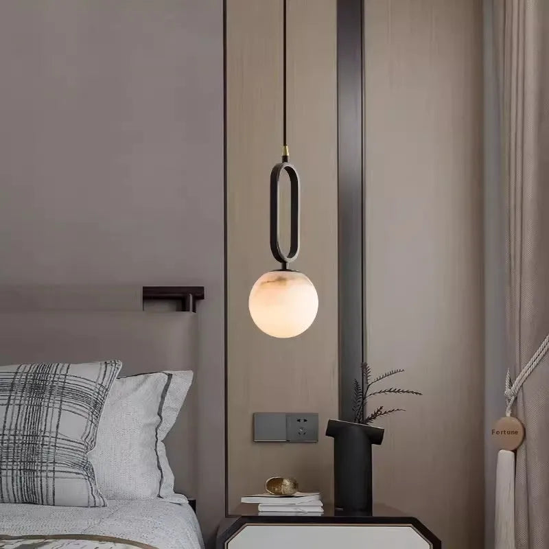 Nordic creative wall light bulb with marble shade and copper frame in black finish, 15cm diameter