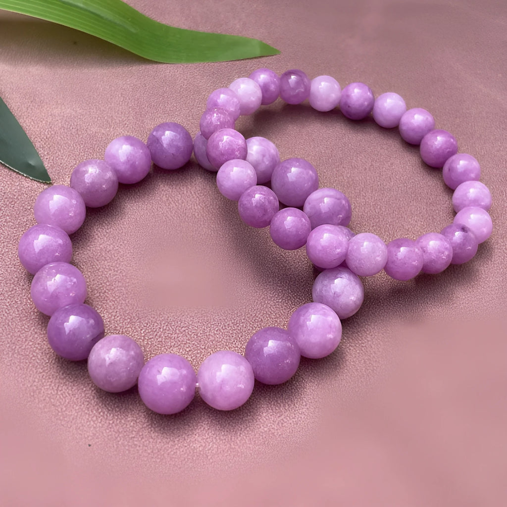 Purple Chinese-style quartz jade bracelet with multi-circle beads on a white background.