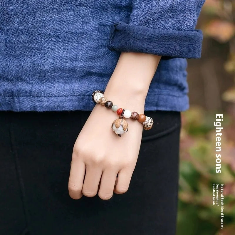 Traditional bodhi seed bracelet with 18 seeds in geometric pattern for unisex wear