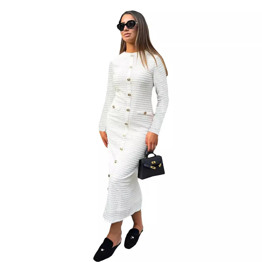 Women's slim fit black knitted long sleeve dress with button detail in French retro style.