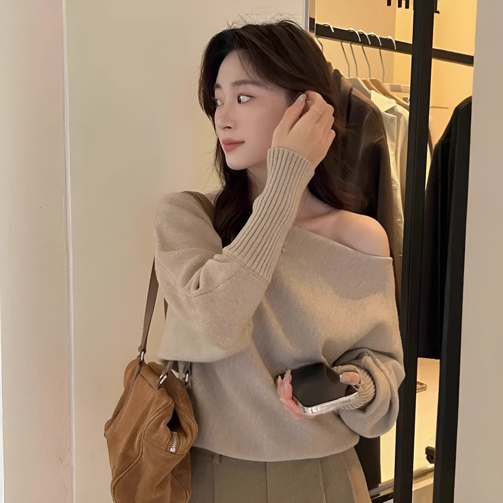 Women's long sleeve viscose blouse pullover in light grey, shown as a casual top.