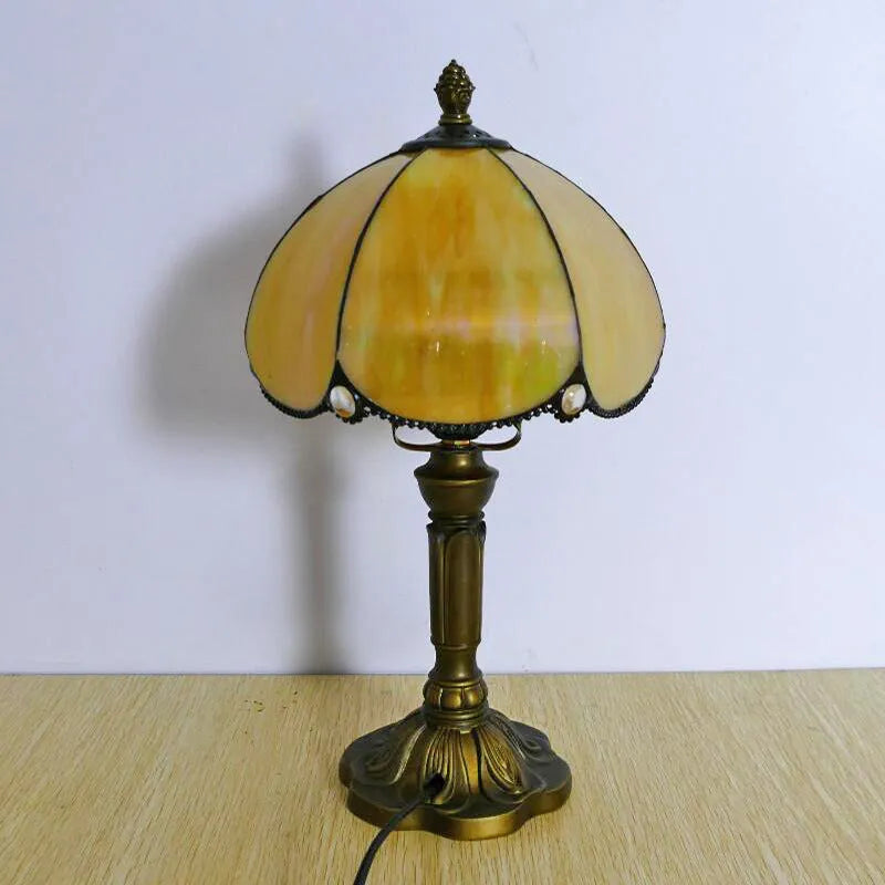 Beige bedside table lamp with simple modern design measuring 20cm wide