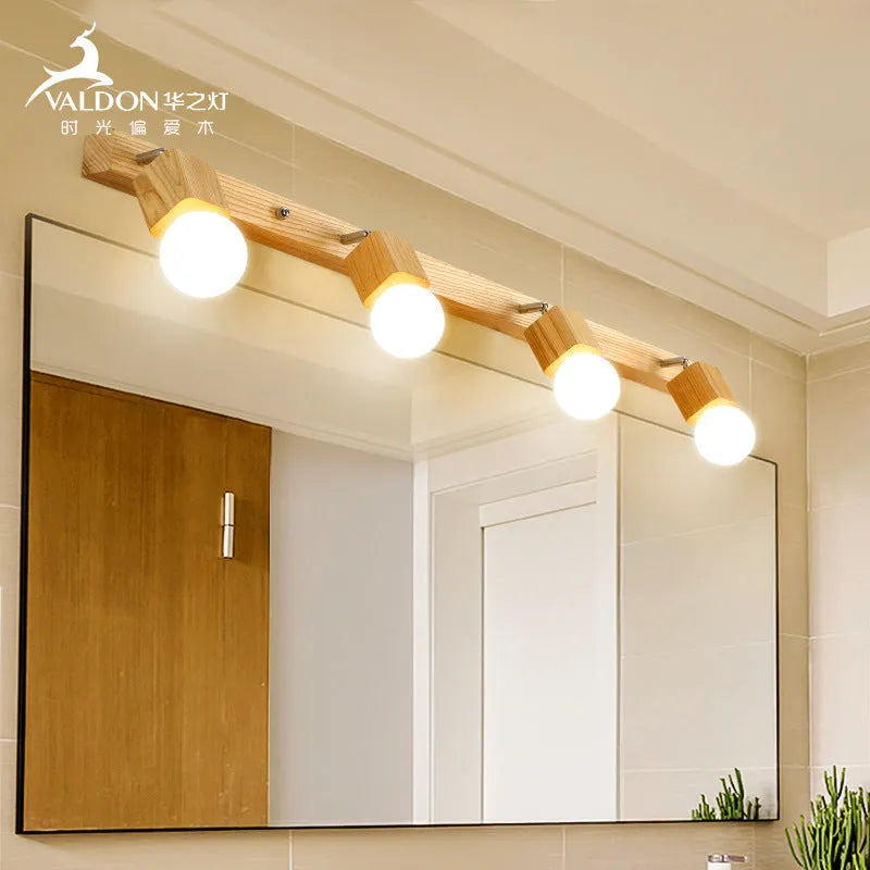Single head 24cm LED wall lamp mounted beside a mirror.