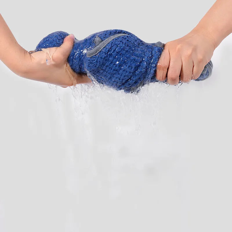 Blue microfiber dog bath robe towel wrapped around dog with adjustable waistband visible
