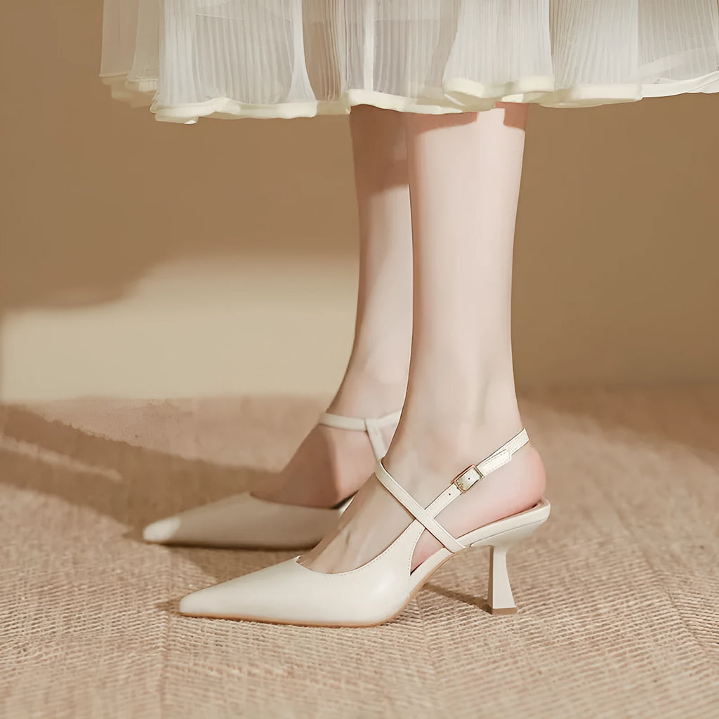 Solid colour women's pointed stiletto heel pumps with imitation sheepskin lining available in apricot brown and black