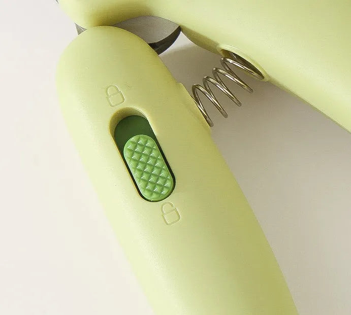 Banana-shaped pet nail clippers in green with metal blades for dog and cat grooming