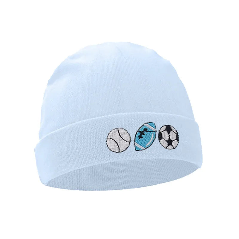Set of white, light blue, and grey cotton baby pullover caps, gloves, and foot covers for infants.