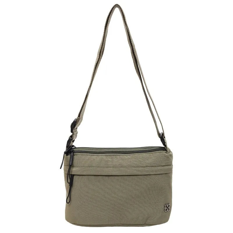 Soft cloth daily lightweight commuter crossbody bag in beige with sandwich pocket and sewn-thread detailing