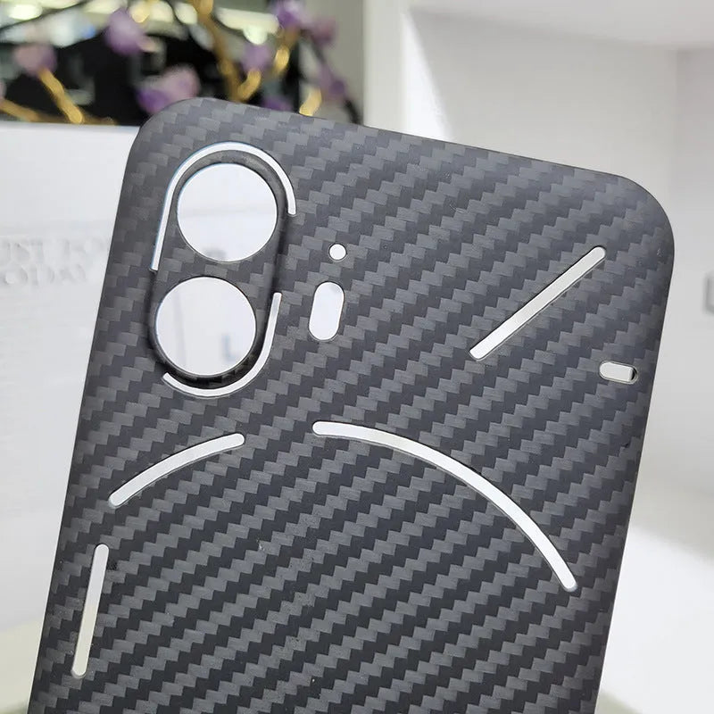 Real aramid fiber phone case in matte black hollow finish for Nothing Phone 2 with plaid texture