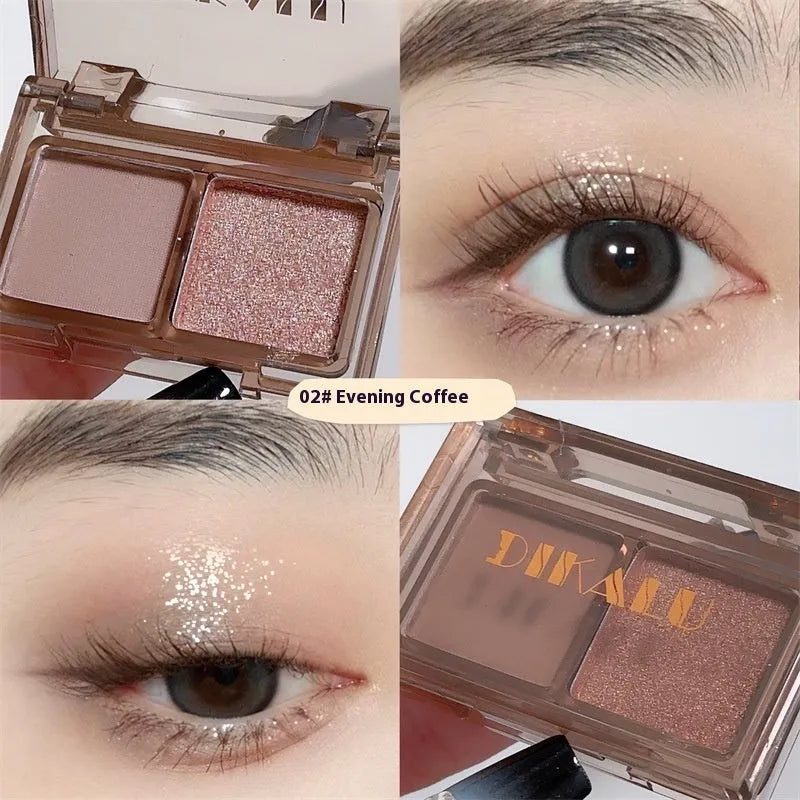 Cool two-tone eye shadow plate showing pink and black matte shimmer colours in a standard cosmetic compact.