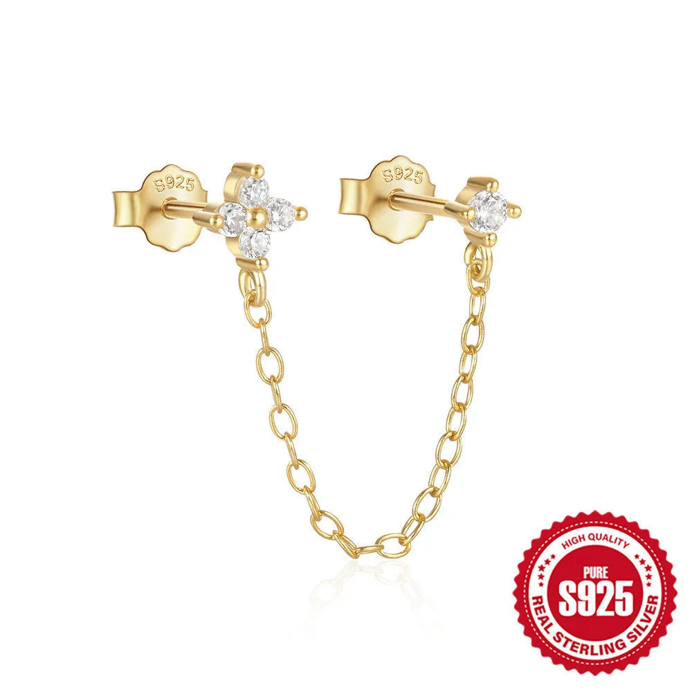 S925 sterling silver ear stud with geometric diamond flower, tassel, and chain design in a gold colour.