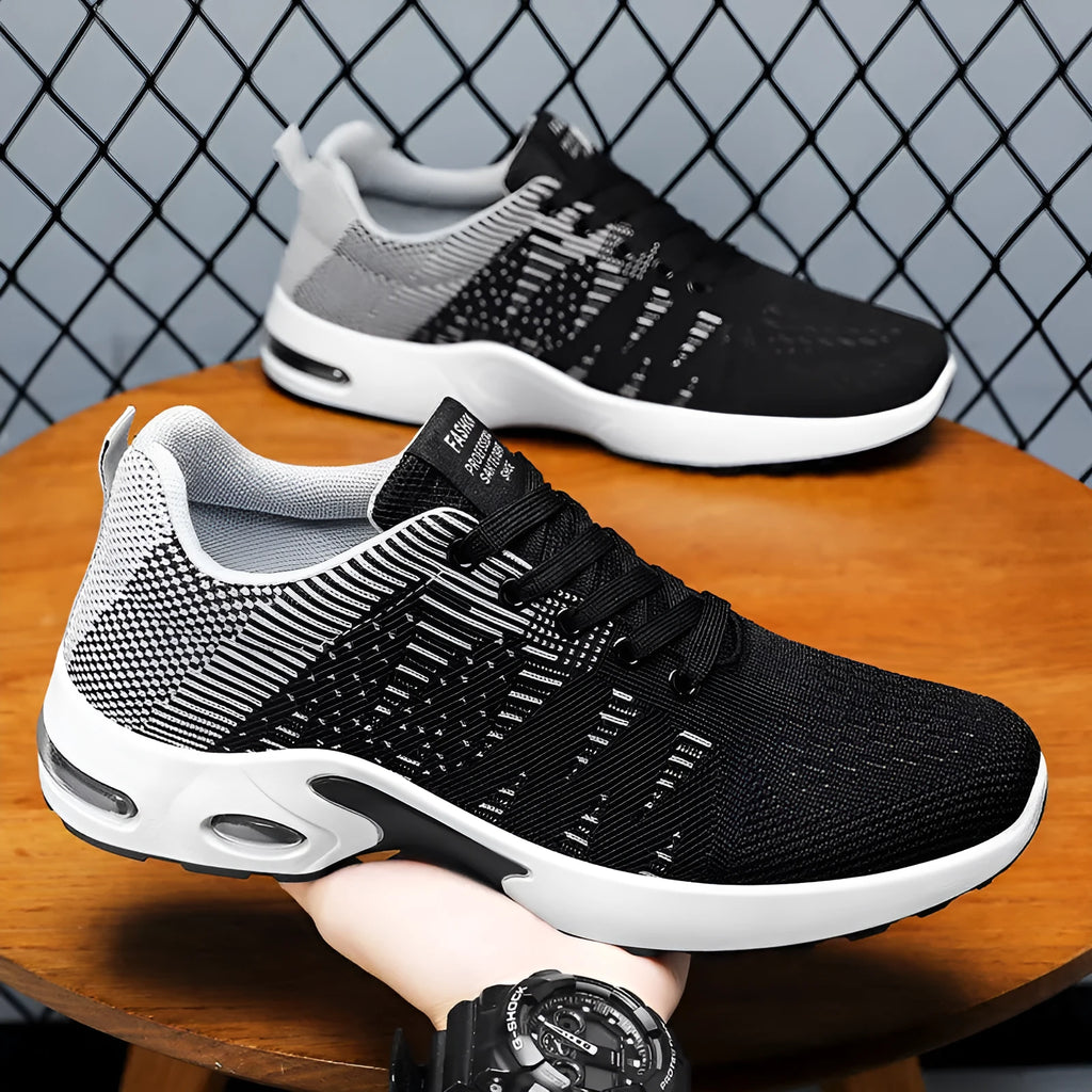 Men's low-top Flyknit mesh sneakers in black with coloured accents on an injection moulded sole