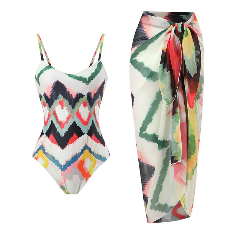 Women's two-piece polyester swimsuit set with matching hip skirt in striped gradient pattern