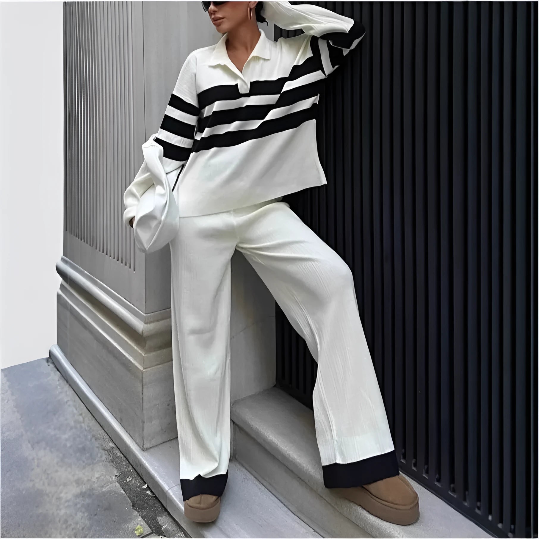 Women's black and white striped knitted polo collar top and trousers two-piece set