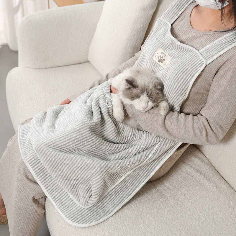 Cat petting apron in cloth material showing colour options including pink, light blue, light purple and striped patterns