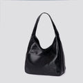 Women's soft PU shoulder bag in retro style with open pocket, shown in one of four colours