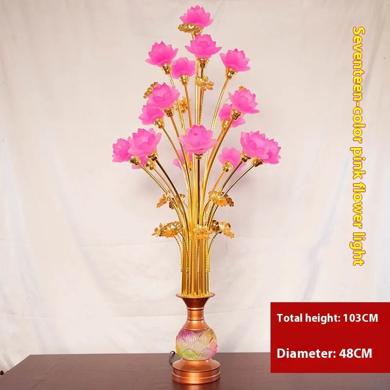 Coloured glaze pink and yellow LED lotus lantern for Buddha worship on an alloy stand.