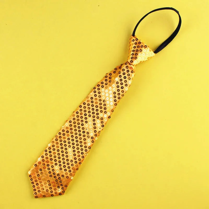 Gold sequin clip-on bow tie with striped pattern on white background.