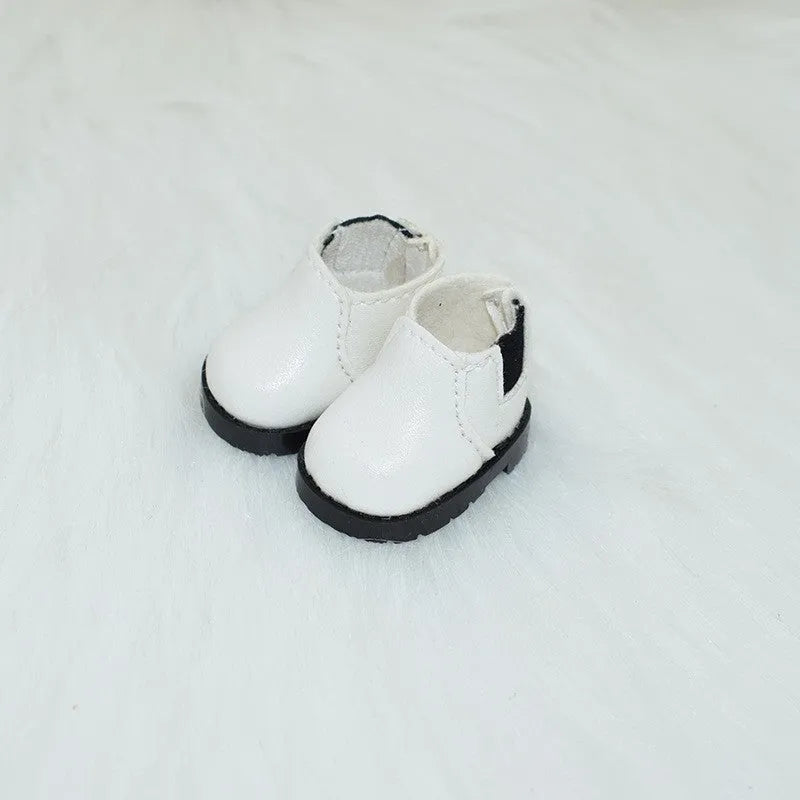 A pair of polyurethane doll shoe accessories for a 17cm figure, shown in a selected style and colour.