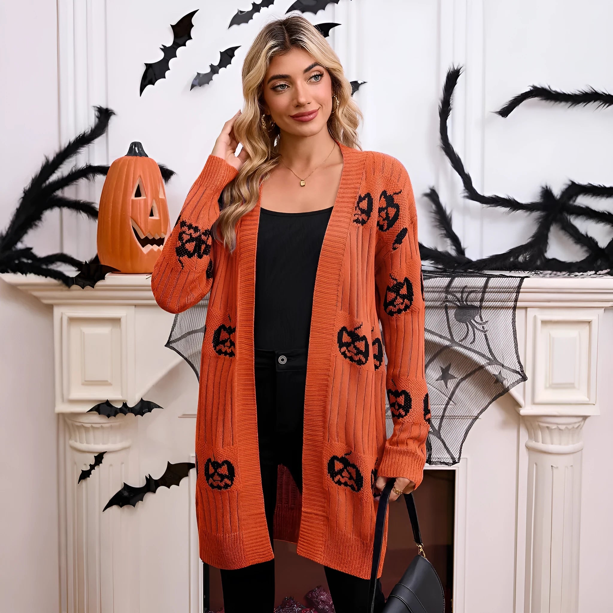 Women's black Halloween cardigan with Jacquard-knitted orange pumpkin head pattern and straight-cut design