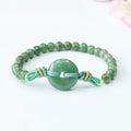 Emerald green jade bracelet with Chinese safety buckle and star-shaped 6mm beads.