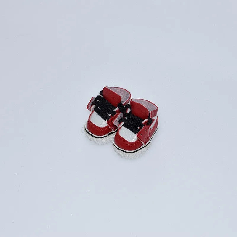 A pair of polyurethane doll shoe accessories for a 17cm figure, shown in a selected style and colour.