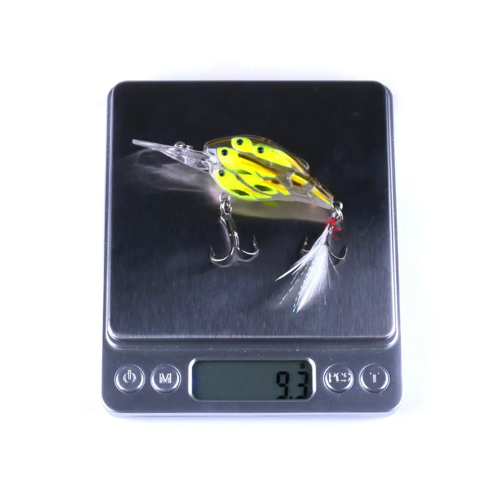 Sea fishing hard bait floating lure with feather tail in one of nine colour options, 7.5cm long.