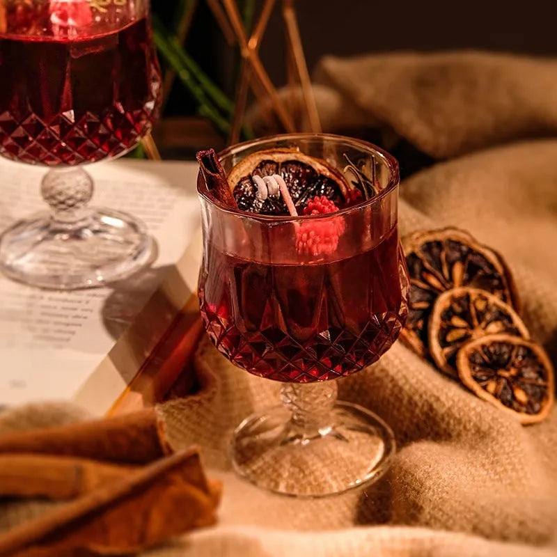 Glass wine goblet containing mulled wine scented candle with crystal jelly wax
