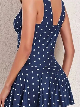 Blue polka dot print women's plus size bikini swimsuit top and briefs.