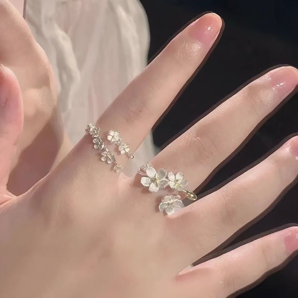 Zinc alloy 3D jasmine flower ring with open mouth design in a choice of patterns and colours.