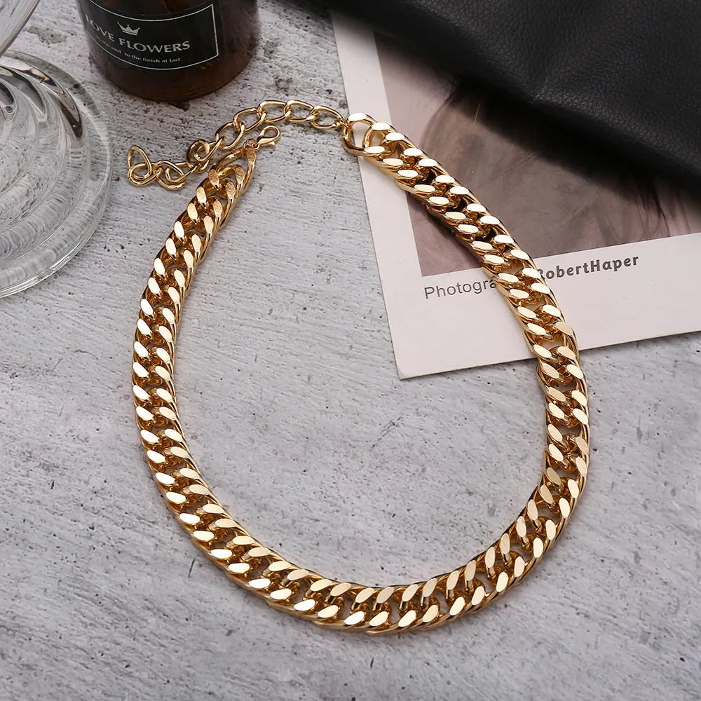 Gold women's thick link chain necklace, 32cm long with 6cm wide alloy links and dense electroplating.