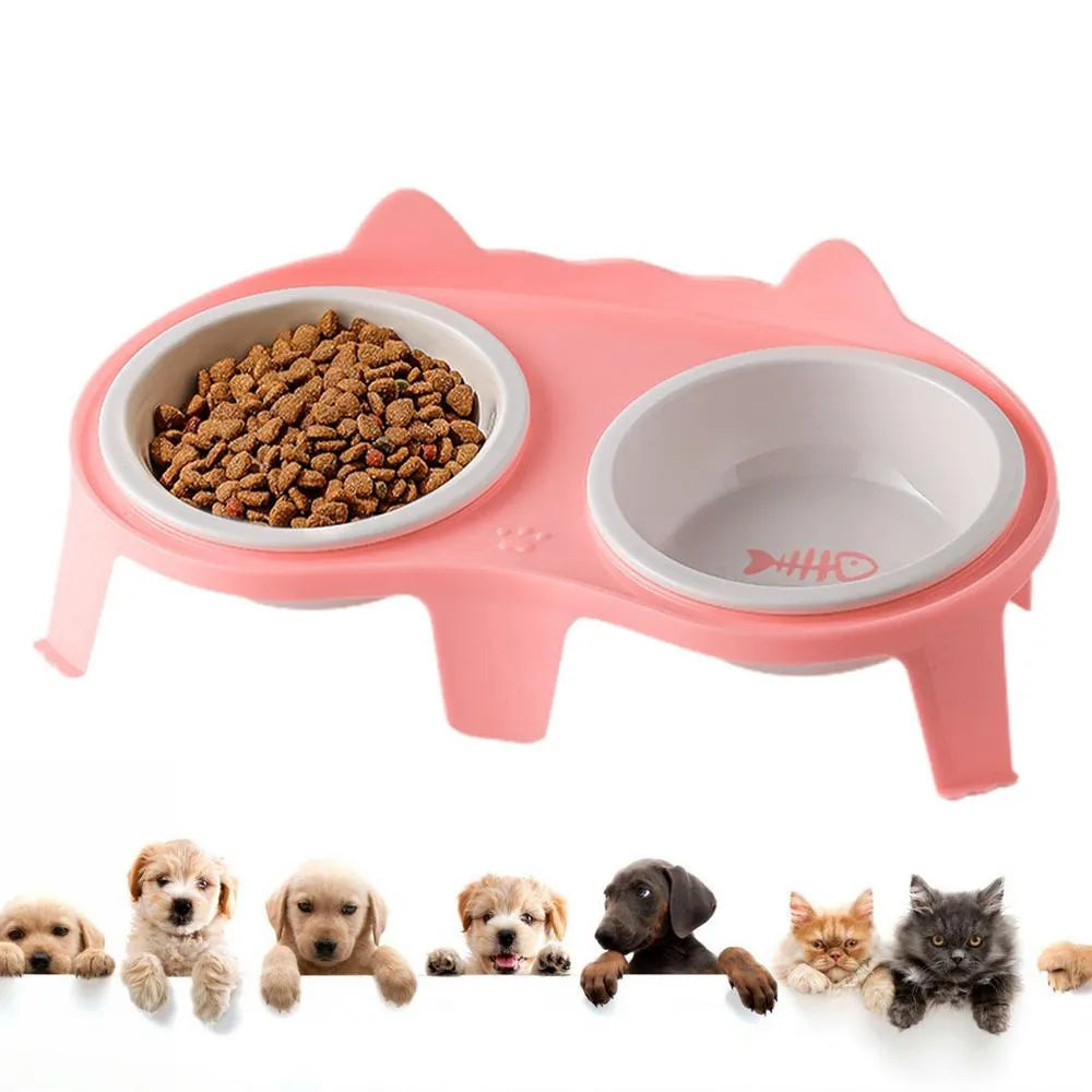 Blue ceramic cat food and water bowl set on a white stand with a hook, showing tilted feeding angle.