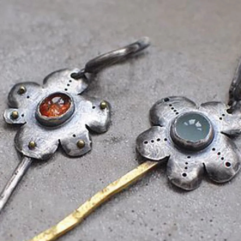 Two-tone geometric retro alloy earrings with asymmetric flower design