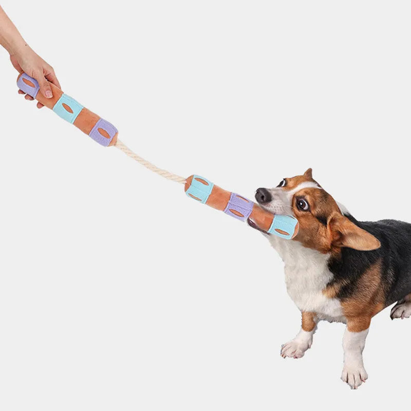 Purple and yellow interactive dog snuffle toy with sound pad and foraging pockets