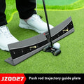 Golf putter resting against the adjustable PVC push rod balancer of the trajectory balance simulator on a carpet.