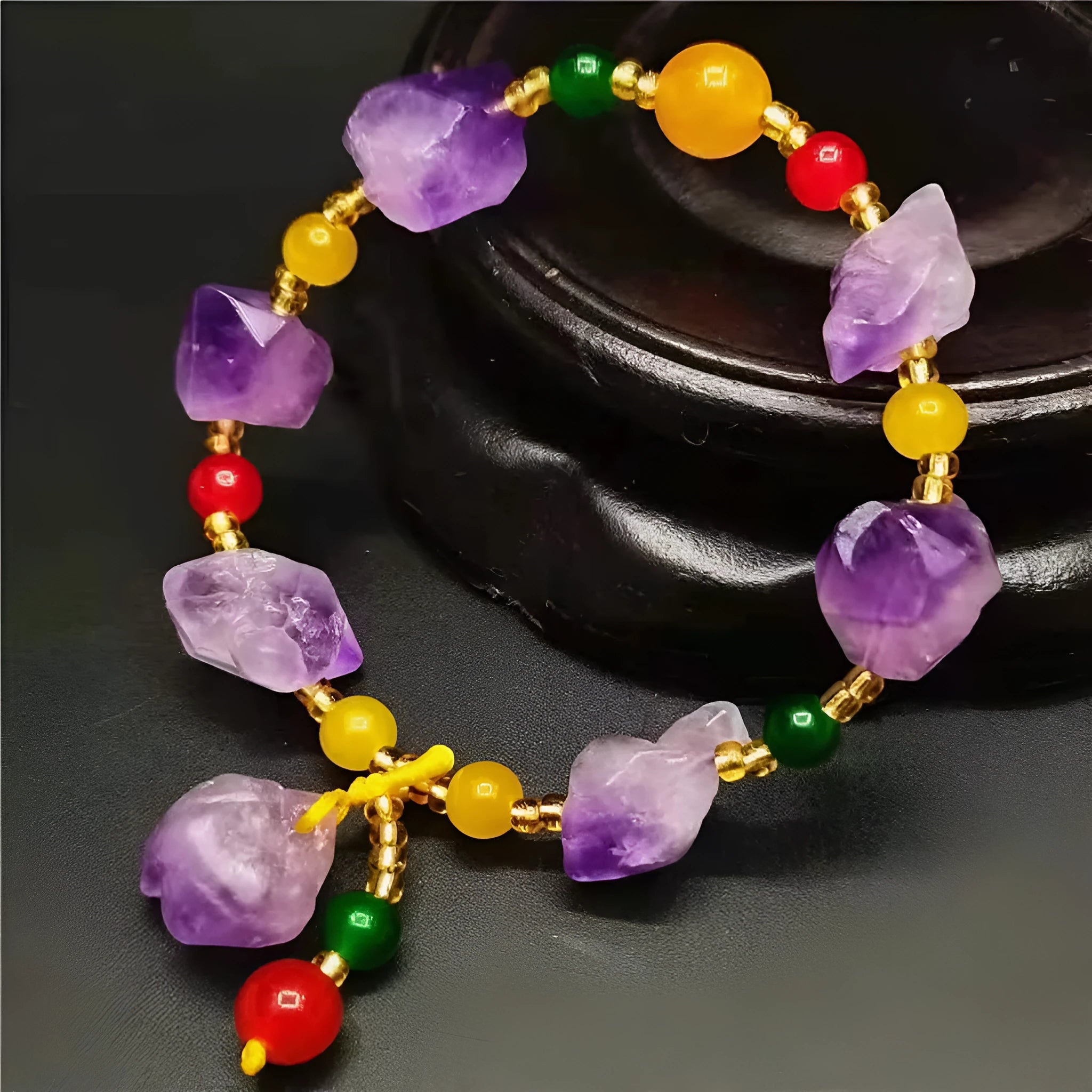 Purple natural shaped amethyst bead bracelet for women with a silver fu character charm.