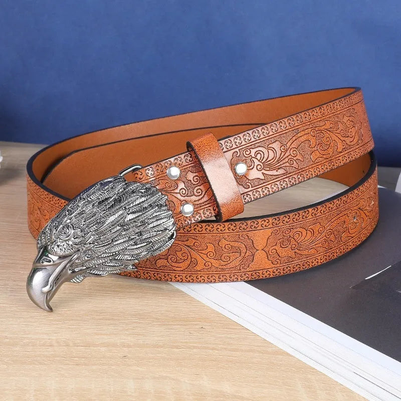 Men's brown imitation leather belt with a detailed silver alloy cow head buckle and pin fastener.