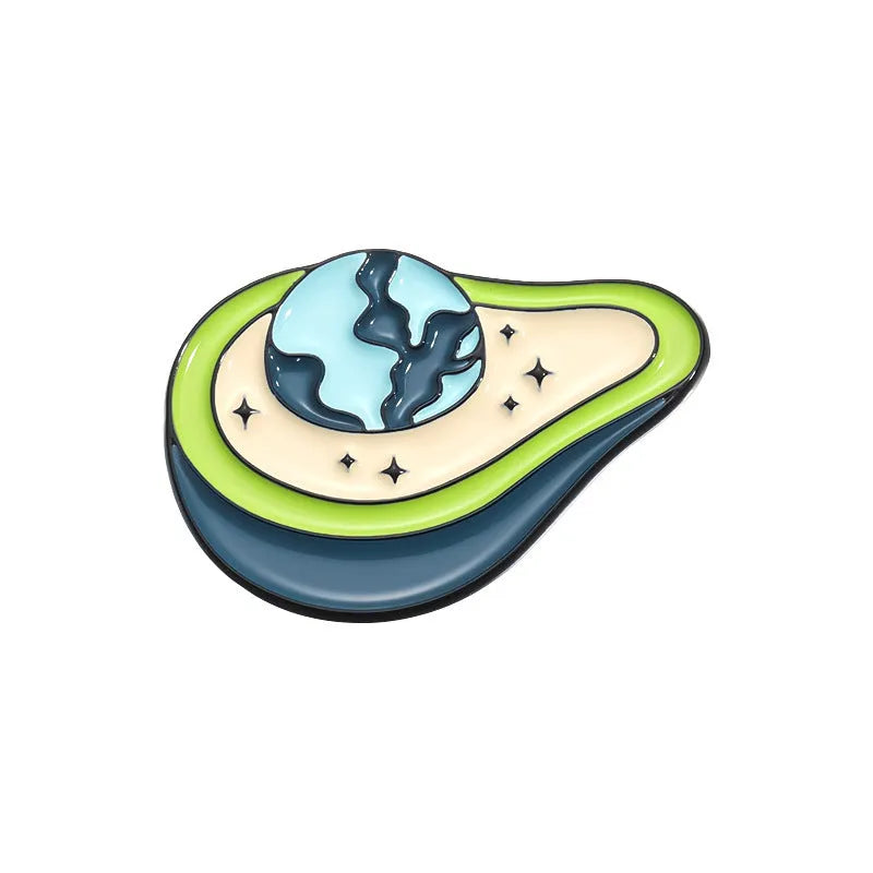 Colourful cartoon-style fruit metal brooch with pin clasp on a denim jacket lapel.