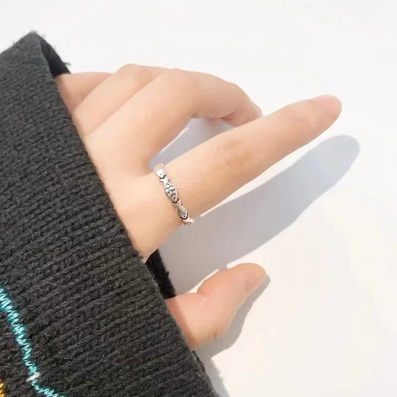 Adjustable sterling silver fish ring with open mouth design and electroplated finish