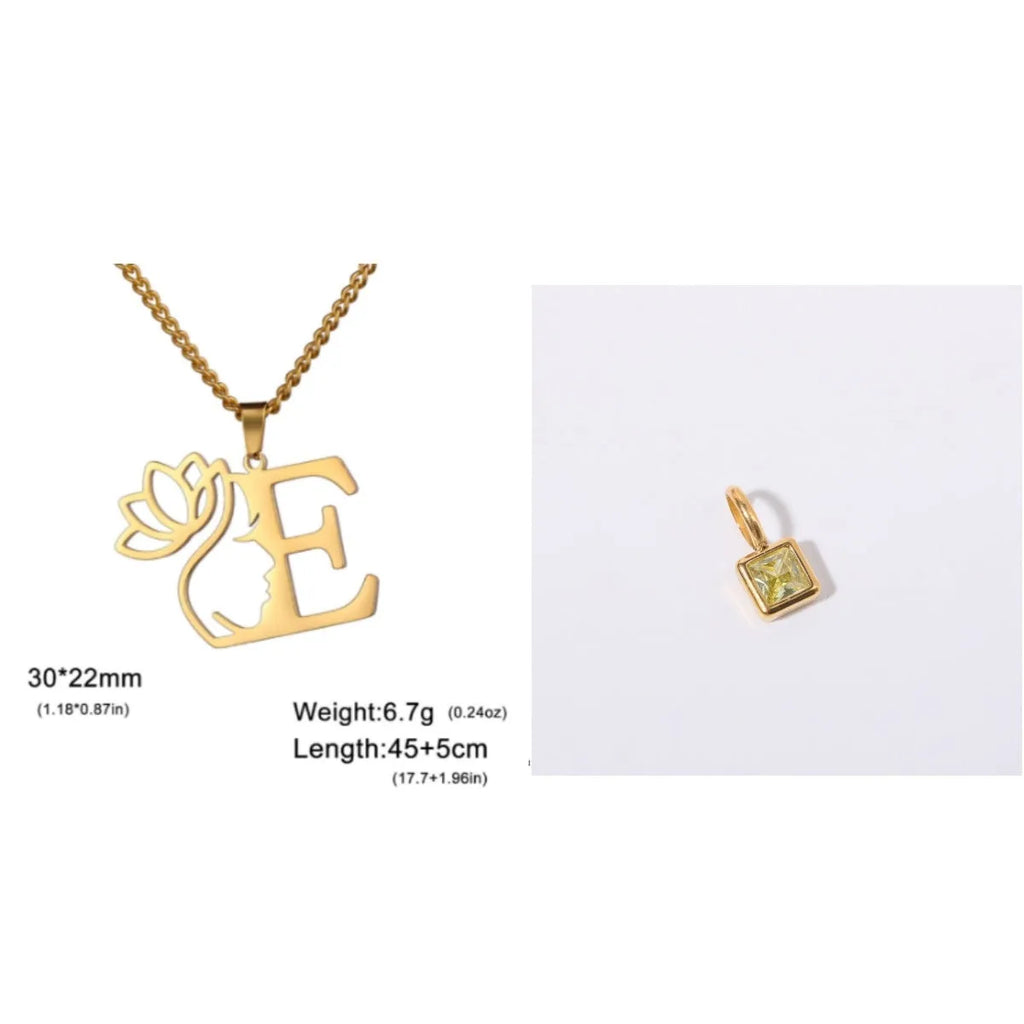 Gold electroplated stainless steel necklace with a cross chain and a letter 'A' pendant on a white background.