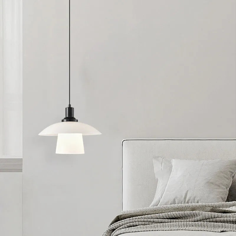 Minimalist black bedside pendant lamp with glass shade and three-colour light fitting