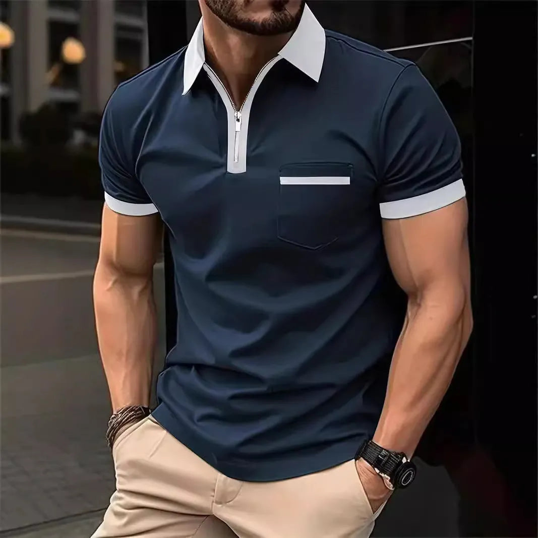 Man wearing a loose-fit men's short sleeve casual shirt with a chest pocket and zipper decoration.