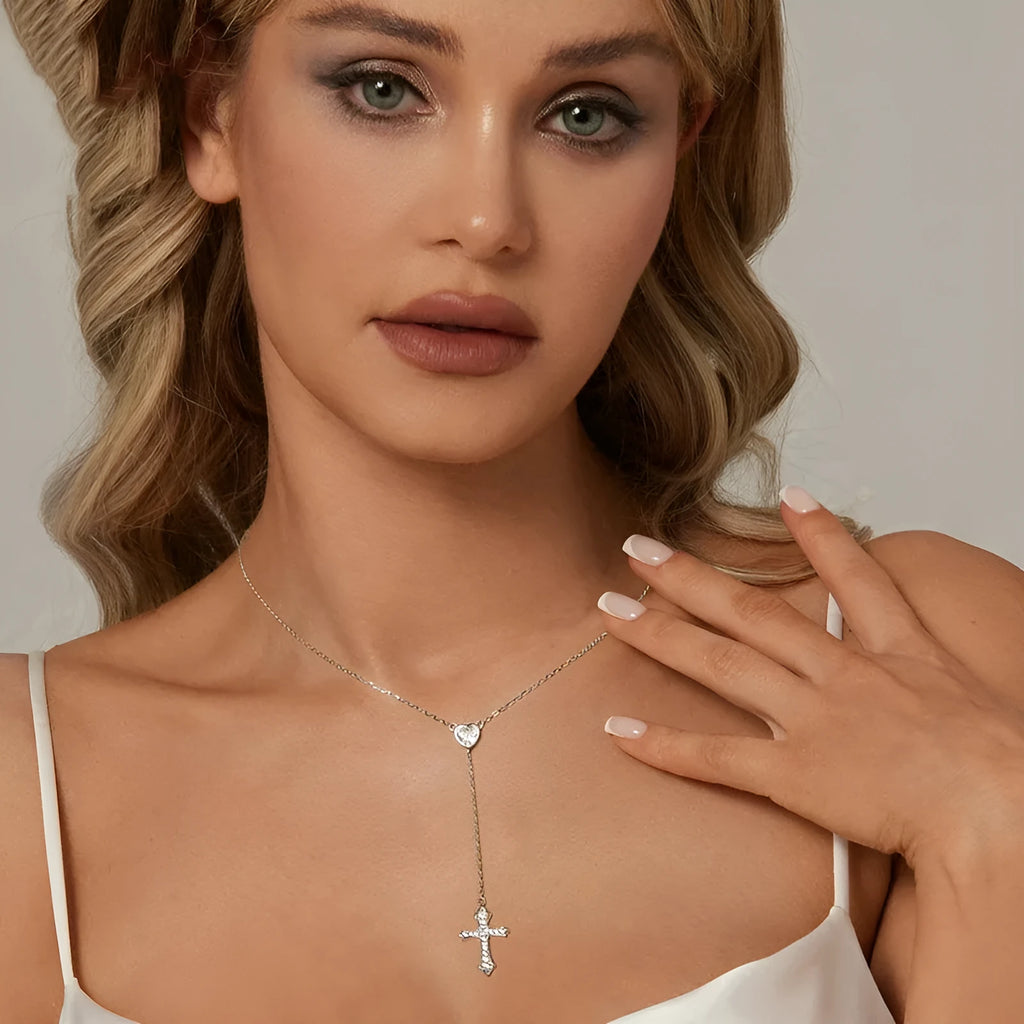 Silver Love Cross pendant necklace with O-ring chain on BSN384 colour background