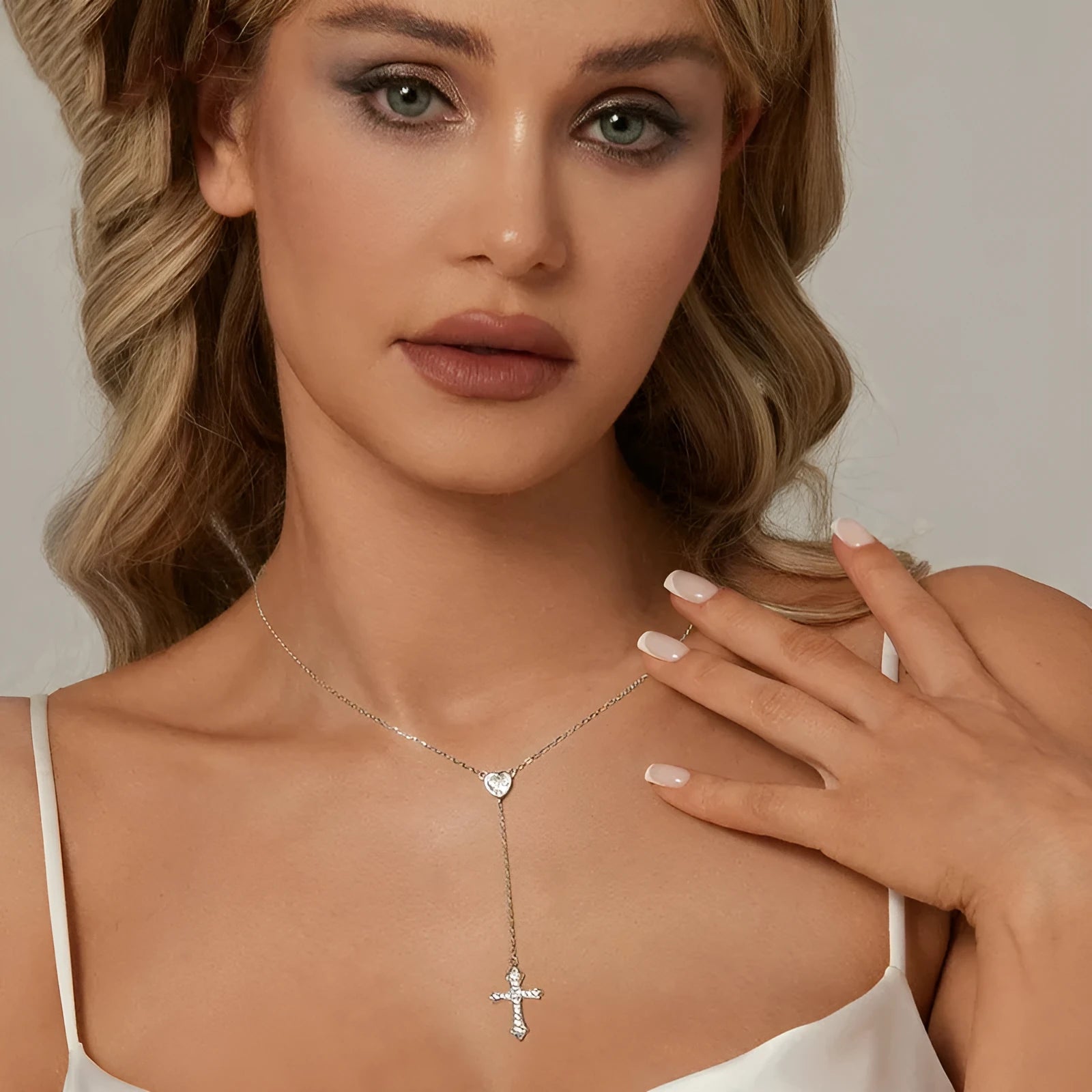 Silver Love Cross pendant necklace with O-ring chain on BSN384 colour background