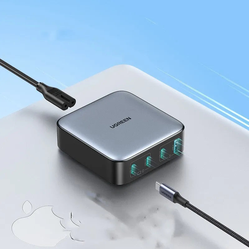 Compact 100W gallium nitride fast charger with Type-C port and included cable on a white background.